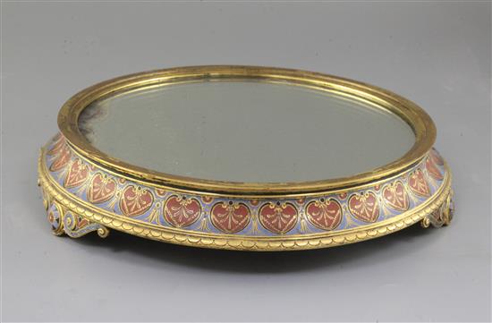 An Elkington & Co champleve enamel and gilt metal mirrored plateau, late 19th century Diam 12in.